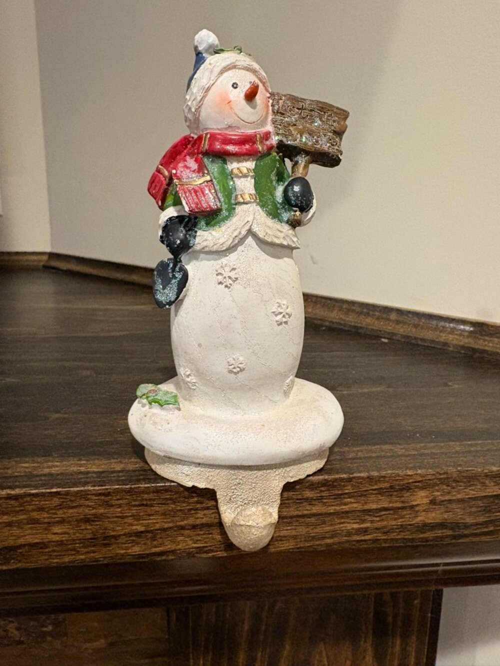Vintage cast iron stocking holder, Snowman with a "let it snow sign" and shovel